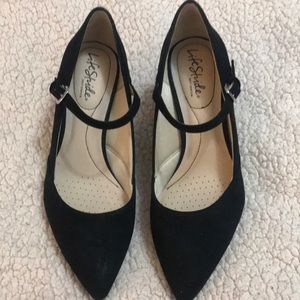 Mary Janes Black suede Right shoe is tight. Would work well for a size 7 foot.